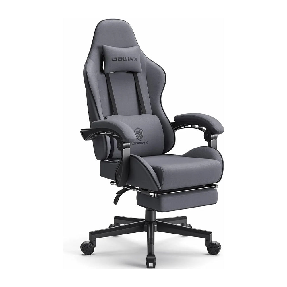 Gaming chair with pocket spring cushion, footrest, and massaging lumbar support for ergonomic comfort.