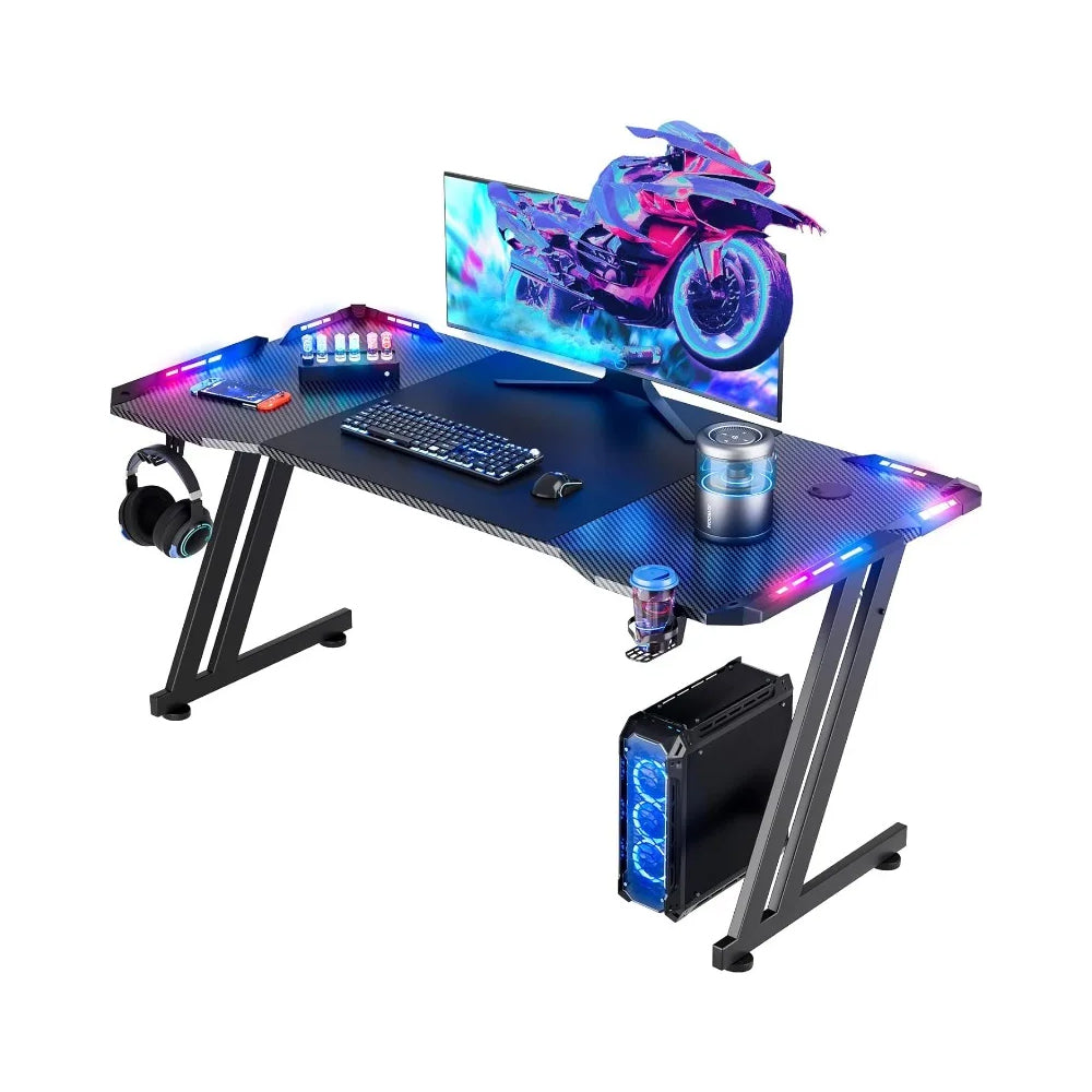 47-inch gaming desk with carbon fiber surface, RGB LED lights, headphone hook, cup holder, and oversized mouse pad for home office or gaming setup