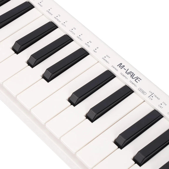 M-VAVE SMK-25 Mini MIDI Keyboard with 25 velocity-sensitive keys and wireless connectivity for portable music production.